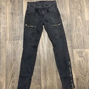 Black jeans with zippers.